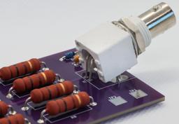 Insert the BNC connector into the PCB